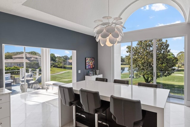9000 Shawn Park Pl, Orlando, FL 32819 - dining space with light tile patterned flooring
