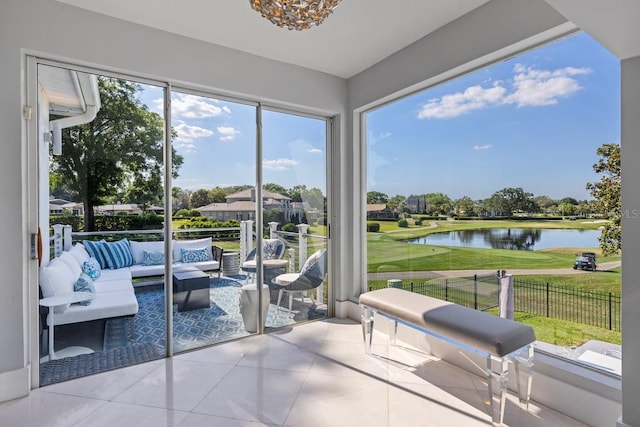 9000 Shawn Park Pl, Orlando, FL 32819 - sunroom with a water view and tile patterned flooring