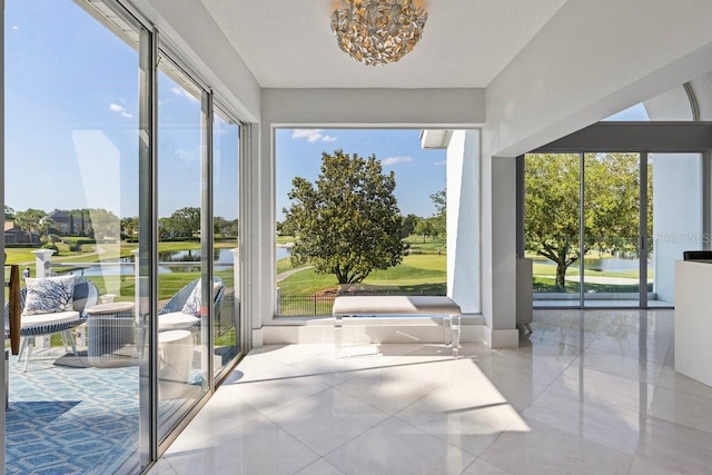 9000 Shawn Park Pl, Orlando, FL 32819 - sunroom / solarium with an inviting chandelier