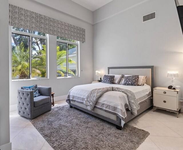 9000 Shawn Park Pl, Orlando, FL 32819 - bedroom featuring visible vents and light tile patterned floors
