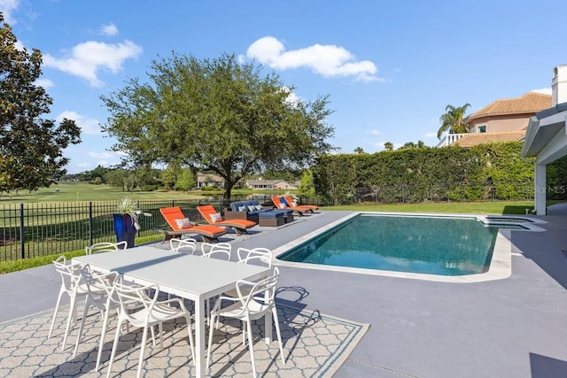 9000 Shawn Park Pl, Orlando, FL 32819 - view of swimming pool featuring fence, outdoor dining space, a patio, and a fenced in pool
