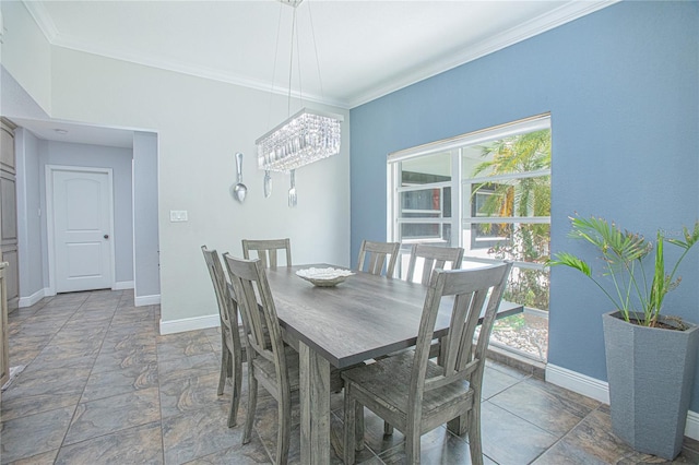 701 Denton Rd, Winter Park, FL 32792 - dining space featuring baseboards, crown molding, a wealth of natural light, and an inviting chandelier