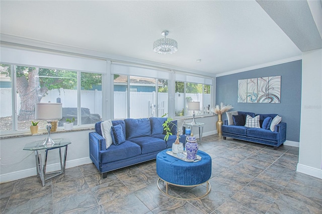 701 Denton Rd, Winter Park, FL 32792 - interior space with stone finish floor, baseboards, crown molding, and a chandelier
