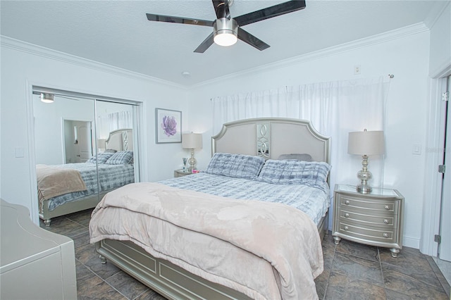 701 Denton Rd, Winter Park, FL 32792 - bedroom featuring a closet, stone finish flooring, a textured ceiling, ceiling fan, and ornamental molding