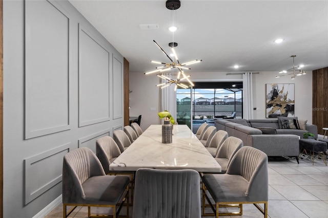 4305 Lana Ave, Davenport, FL 33897 - dining space featuring light tile patterned floors, recessed lighting, a chandelier, and visible vents