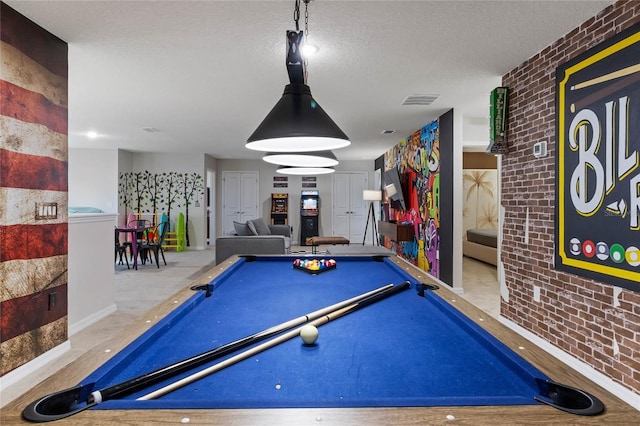4305 Lana Ave, Davenport, FL 33897 - game room featuring pool table, visible vents, brick wall, and a textured ceiling