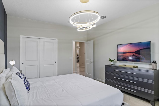4305 Lana Ave, Davenport, FL 33897 - bedroom featuring a closet, visible vents, and a chandelier