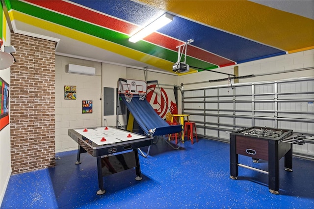 4305 Lana Ave, Davenport, FL 33897 - recreation room featuring a wall unit AC, a garage, and electric panel