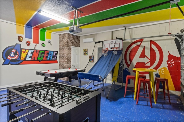 4305 Lana Ave, Davenport, FL 33897 - game room with concrete block wall and a wall unit AC