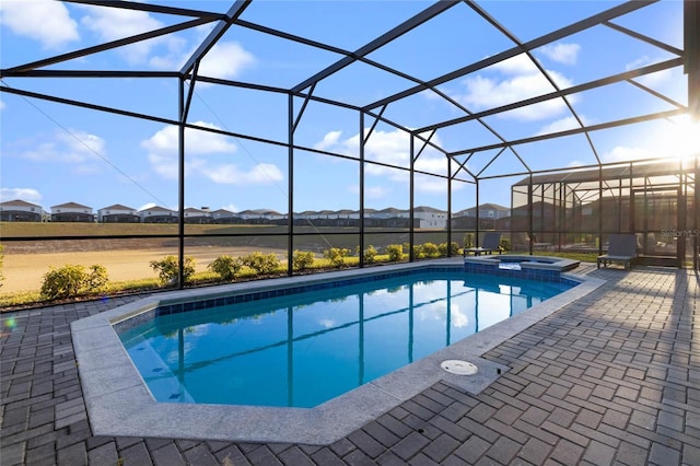 4305 Lana Ave, Davenport, FL 33897 - view of pool featuring a pool with connected hot tub, a lanai, and a patio
