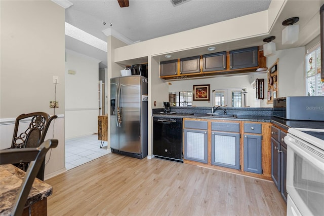 5813 Parkview Point Dr, Orlando, FL 32821 - kitchen featuring a sink, white electric stove, stainless steel refrigerator with ice dispenser, black dishwasher, and dark countertops
