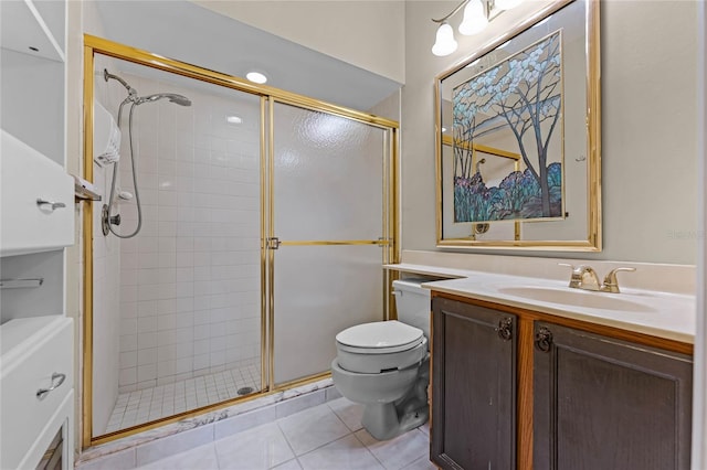 5813 Parkview Point Dr, Orlando, FL 32821 - full bathroom with a shower stall, tile patterned floors, toilet, and vanity