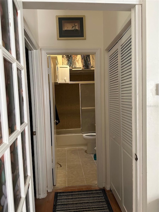 5813 Parkview Point Dr, Orlando, FL 32821 - hallway featuring tile patterned flooring