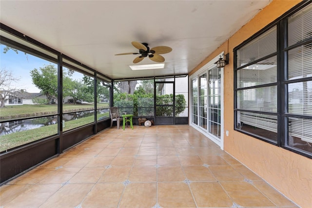 5813 Parkview Point Dr, Orlando, FL 32821 - unfurnished sunroom with a water view and a ceiling fan