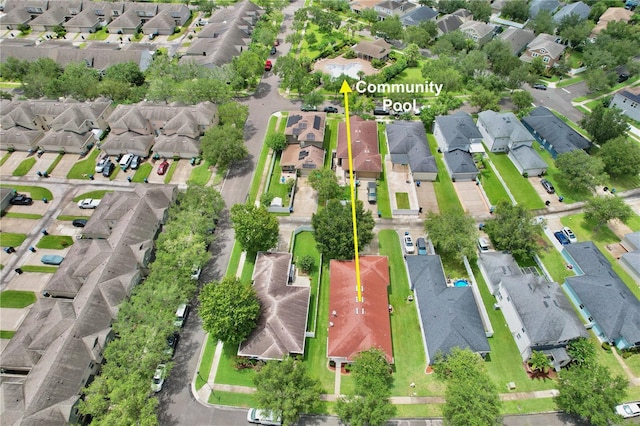 birds eye view of property with a residential view