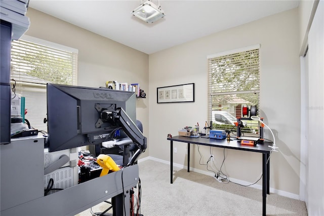 carpeted office with baseboards