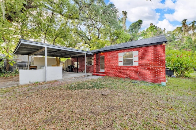 1413 36th St, Orlando, FL 32839 - exterior space with brick siding and a yard