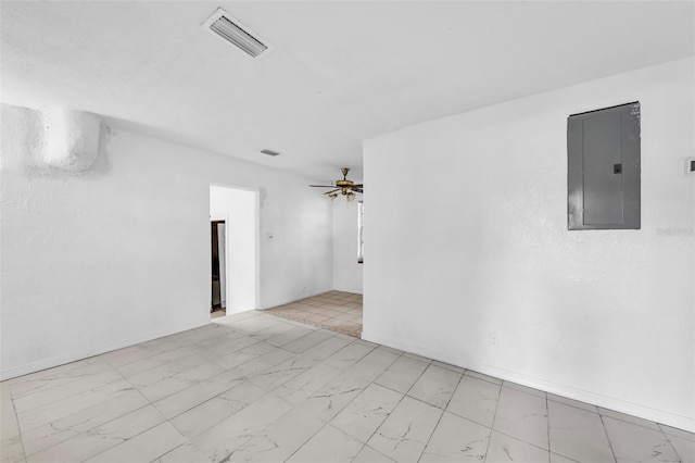 1413 36th St, Orlando, FL 32839 - spare room featuring electric panel, visible vents, marble finish floor, and a ceiling fan