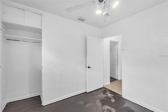 1413 36th St, Orlando, FL 32839 - unfurnished bedroom featuring baseboards, ceiling fan, visible vents, and a closet