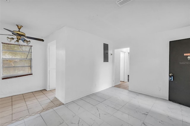 1413 36th St, Orlando, FL 32839 - spare room with electric panel, a ceiling fan, marble finish floor, baseboards, and visible vents