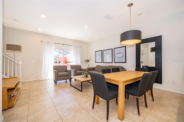 dining room featuring light tile patterned flooring, baseboards, recessed lighting, and visible vents