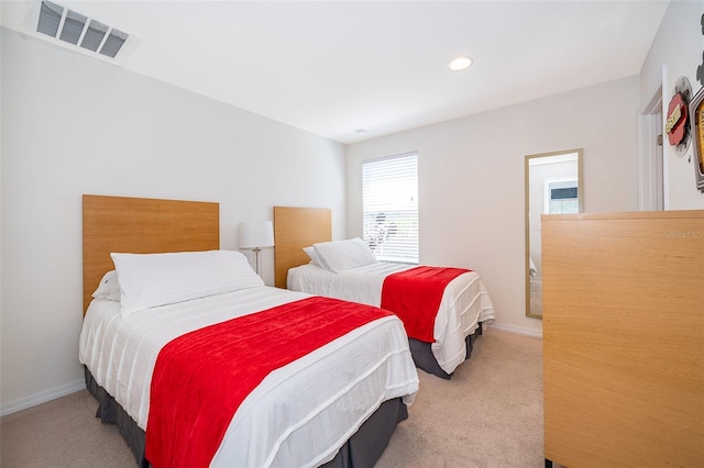 bedroom featuring baseboards, carpet flooring, visible vents, and recessed lighting
