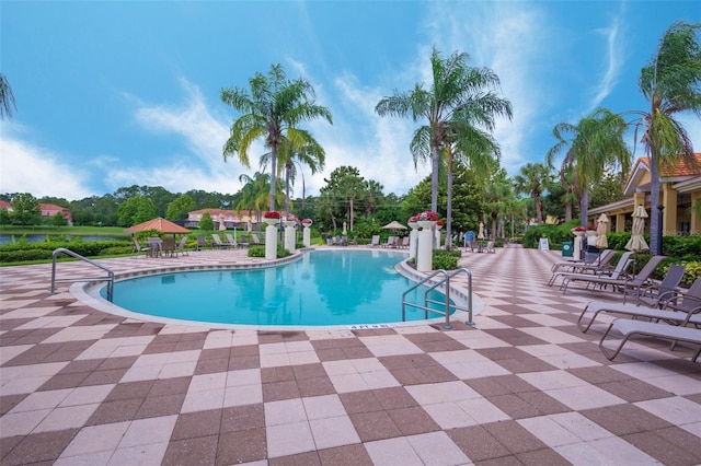 pool with a patio area