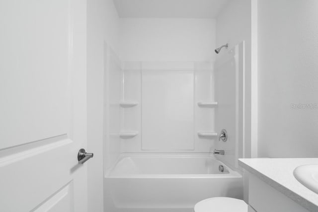 full bathroom with toilet, vanity, and bathing tub / shower combination