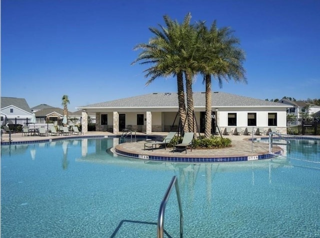3043 Beaver Creek Dr, Kissimmee, FL 34746 - pool featuring a patio and fence