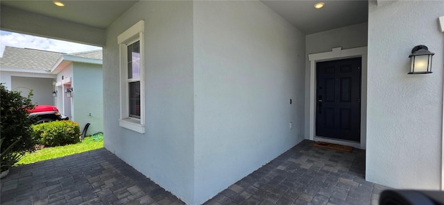3043 Beaver Creek Dr, Kissimmee, FL 34746 - doorway to property featuring stucco siding
