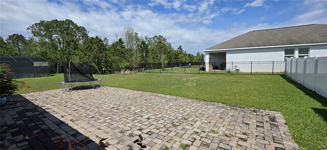 3043 Beaver Creek Dr, Kissimmee, FL 34746 - view of patio / terrace featuring a trampoline