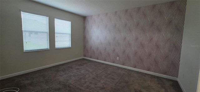 3043 Beaver Creek Dr, Kissimmee, FL 34746 - unfurnished room featuring carpet and baseboards
