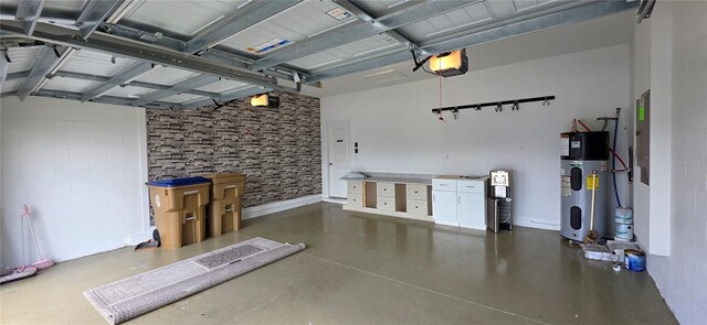3043 Beaver Creek Dr, Kissimmee, FL 34746 - garage with heat pump water heater and a garage door opener