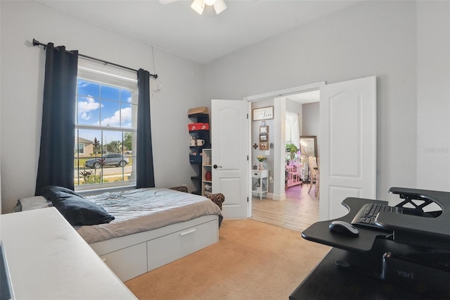 bedroom with light carpet