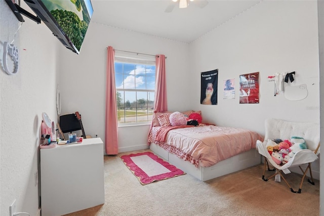 carpeted bedroom featuring a ceiling fan