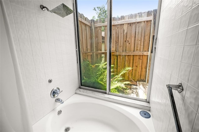 bathroom featuring tile walls