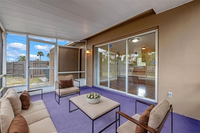 sunroom / solarium with an outdoor hangout area