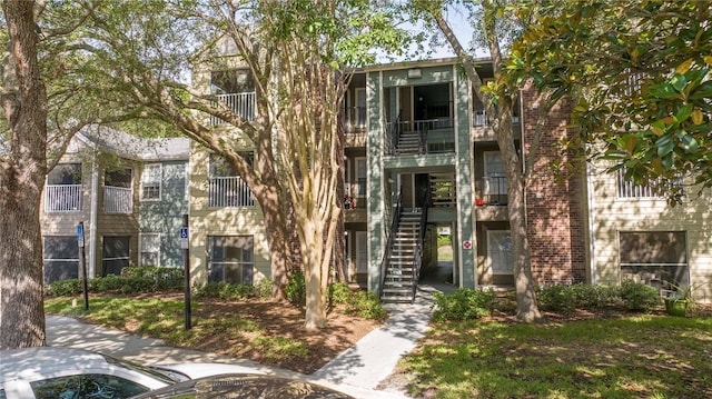 5136 Park Central Dr Unit 212, Orlando, FL 32839 - view of building exterior with stairs