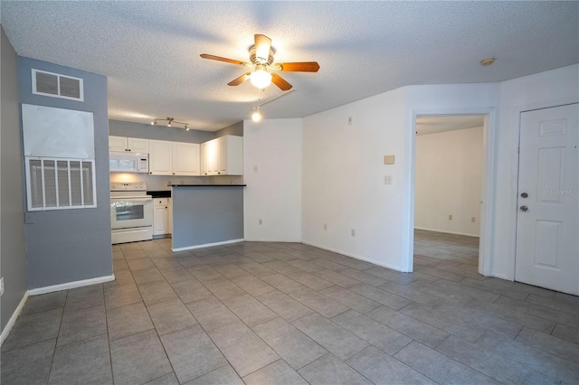 5136 Park Central Dr Unit 212, Orlando, FL 32839 - unfurnished living room with baseboards, ceiling fan, a textured ceiling, and visible vents