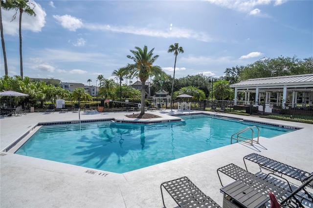5136 Park Central Dr Unit 212, Orlando, FL 32839 - community pool featuring a patio and fence