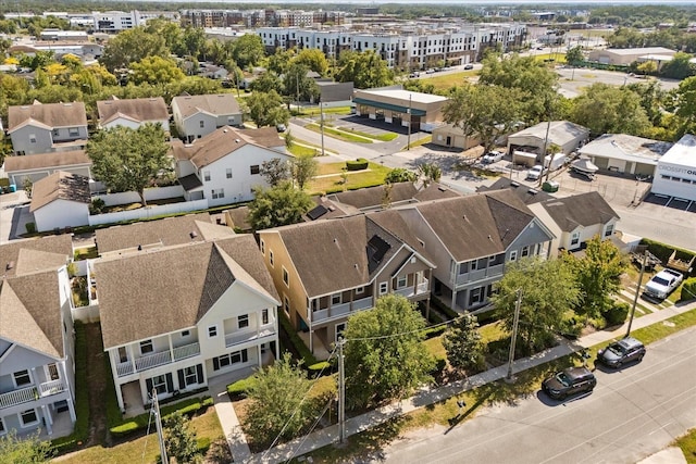 birds eye view of property with a residential view