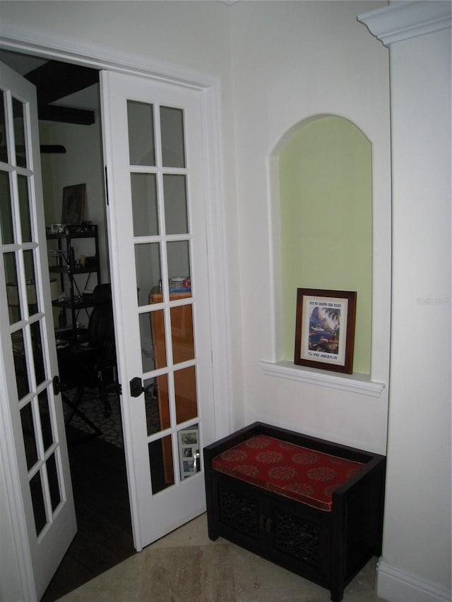 entryway with french doors and tile patterned flooring