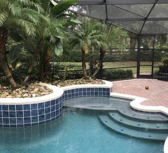 pool with a jacuzzi