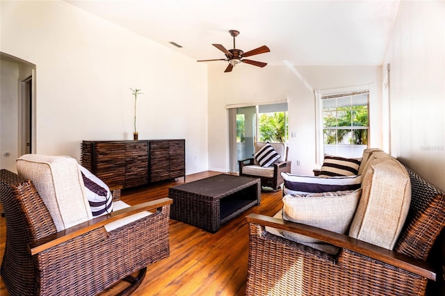 151 Bell Tower Xing W, Kissimmee, FL 34759 - living area featuring a ceiling fan, wood finished floors, and vaulted ceiling