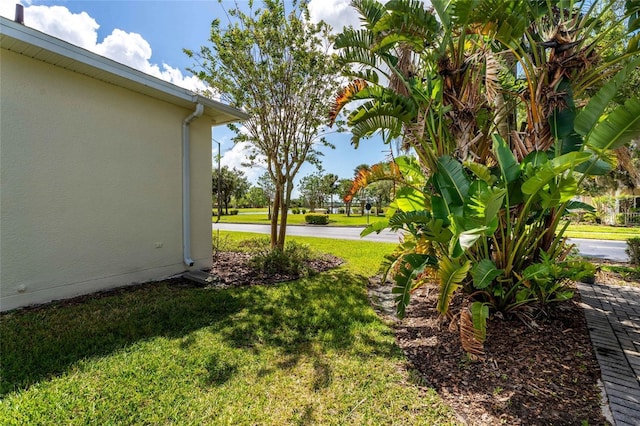 151 Bell Tower Xing W, Kissimmee, FL 34759 - view of grassy yard