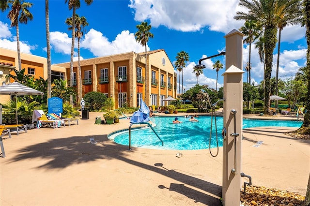151 Bell Tower Xing W, Kissimmee, FL 34759 - community pool featuring a patio