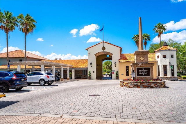 151 Bell Tower Xing W, Kissimmee, FL 34759 - view of property featuring uncovered parking