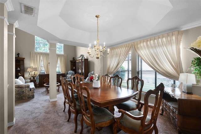 3033 Zaharias Dr, Orlando, FL 32837 - dining area featuring a healthy amount of sunlight, a notable chandelier, carpet, and visible vents