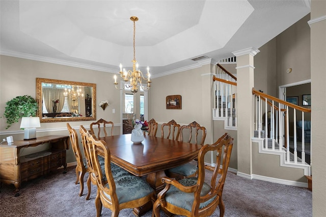 3033 Zaharias Dr, Orlando, FL 32837 - carpeted dining area featuring baseboards, an inviting chandelier, stairway, visible vents, and a raised ceiling