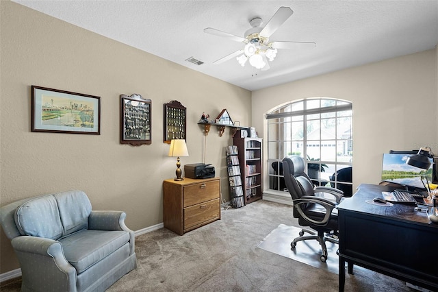 3033 Zaharias Dr, Orlando, FL 32837 - carpeted home office with visible vents, baseboards, a ceiling fan, and a textured ceiling